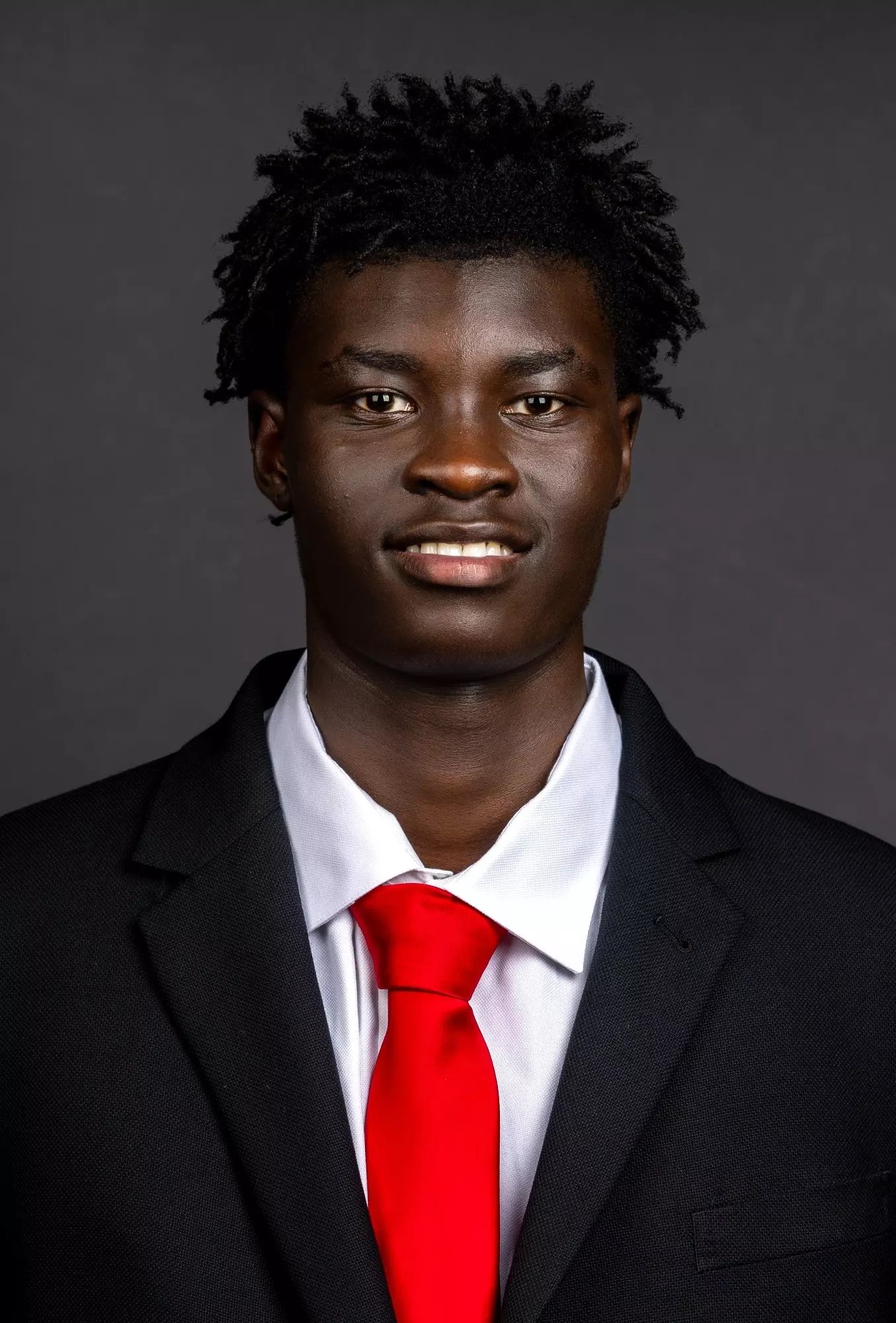 Rho Omed headshot